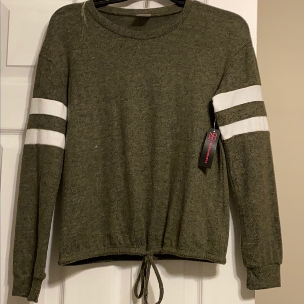 A dark green long sleeve shirt with strings